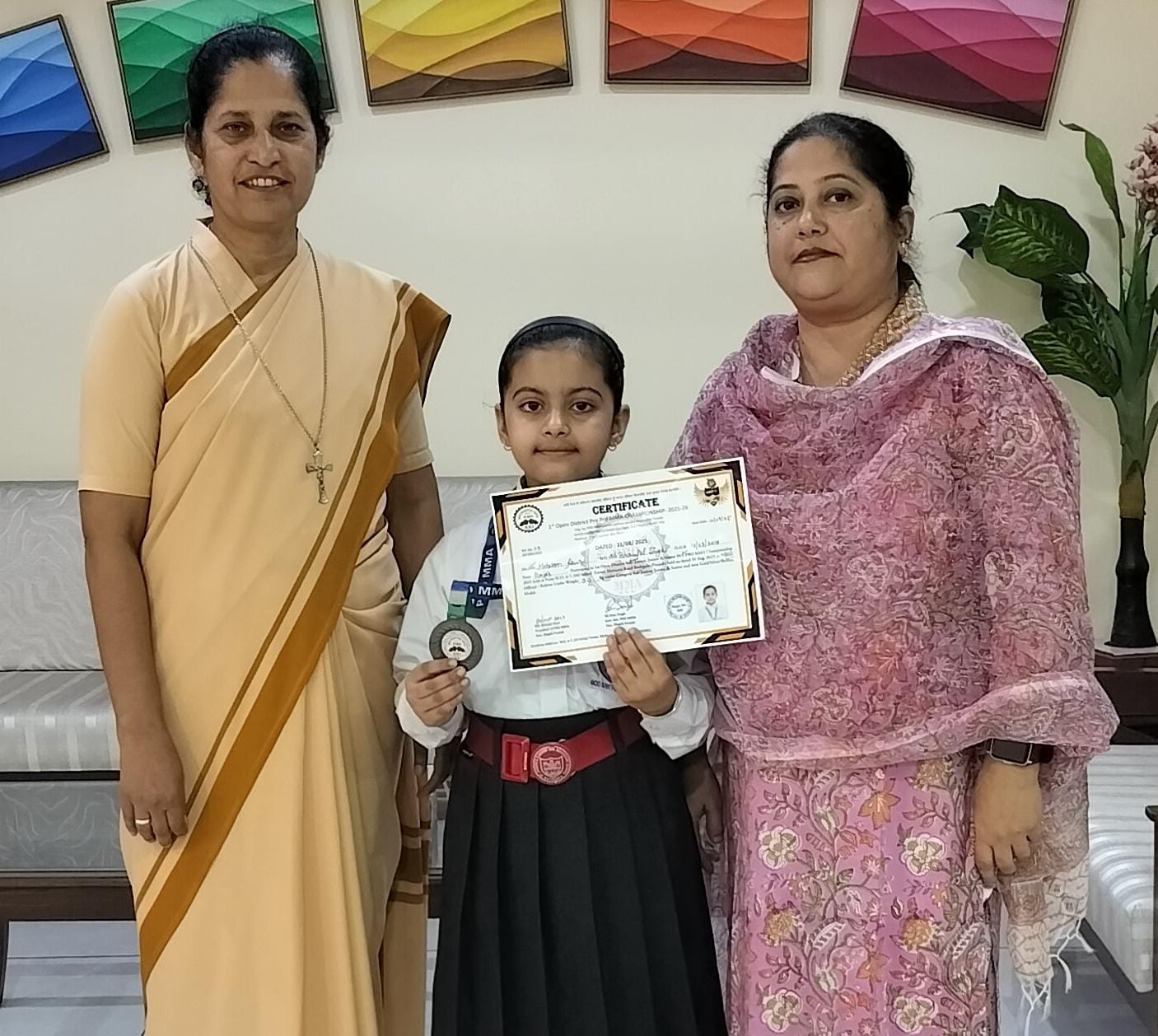 BRONZE MEDAL AND A CERTIFICATE AT 1ST OPEN DISTRICT SUB JUNIOR MMA CHAMPIONSHIP