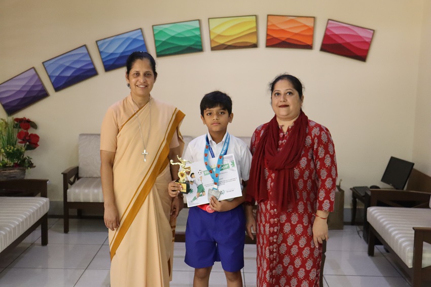 A MEDAL AND A TROPHY AT MAFA SUMMER LEAGUE