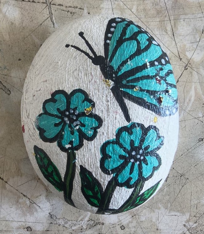 Stone Painting by Vanya Gupta.